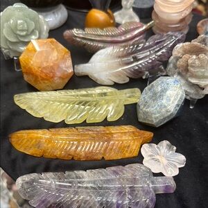 Assorted feathers, flowers, and diamonds
